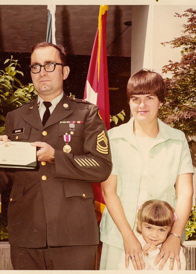 Bill, receiving an award, with Trish and Theresa (cropped)